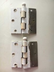 photo of two painted hinges