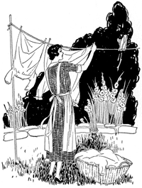 woman hanging out clothes.