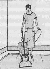 Woman with vacuum.