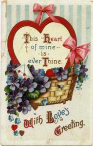 Valentine of basket full of flowers.