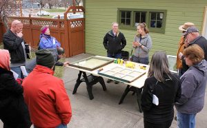 People at a window repair demo.
